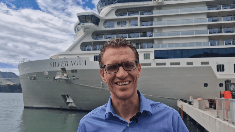 Ron from Spirit of Travel standing in front of the Silver Nova Luxury Cruiseship